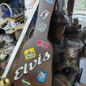 Brown Decorative Guitar Case with Travel Sticker Accents